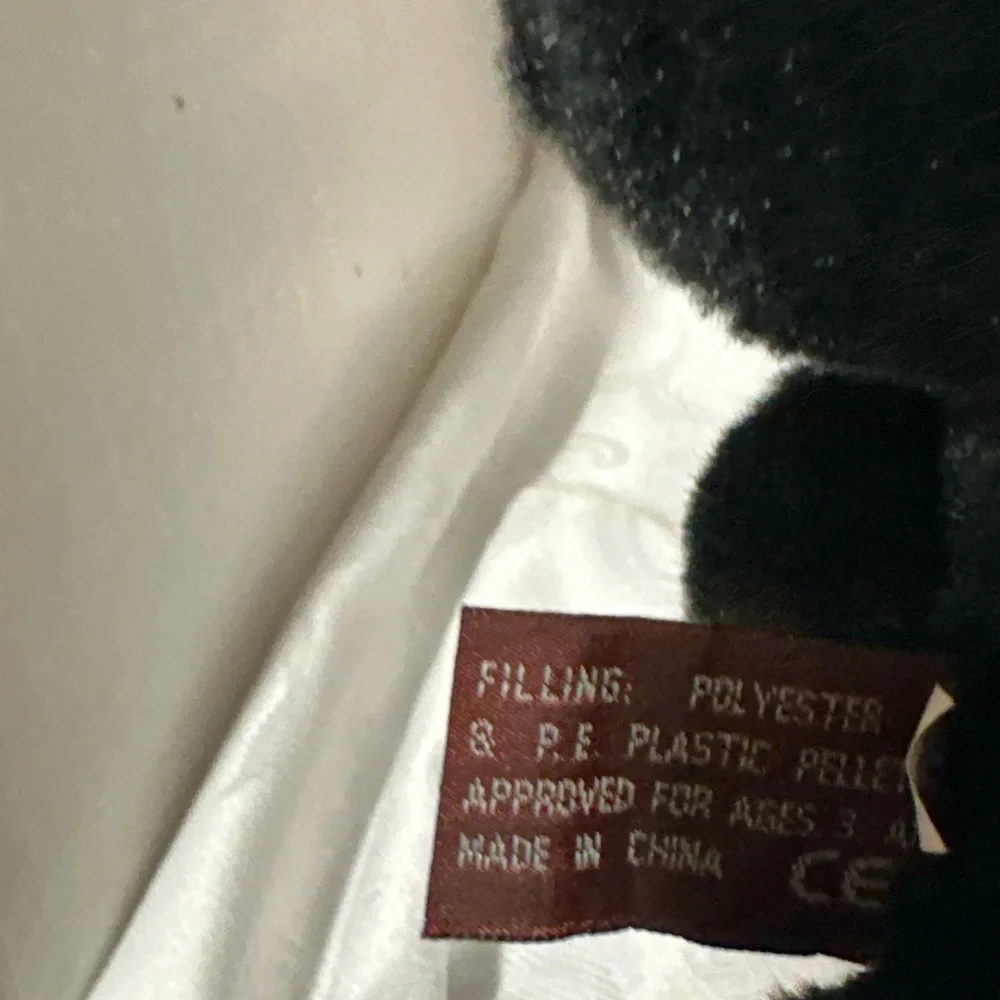 Black and Brown Plush Bear